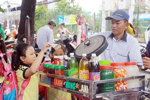 Kiểm soát đồ ăn vặt và nước giải khát có đường khi trẻ nghỉ hè- Ảnh 1.